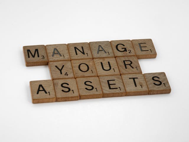 Charles Melita reviewing an asset protection plan with clients